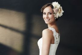 Woman smiling wearing her wedding gown
