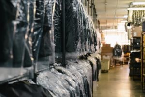 Drycleaned suits hung up ready for delivery